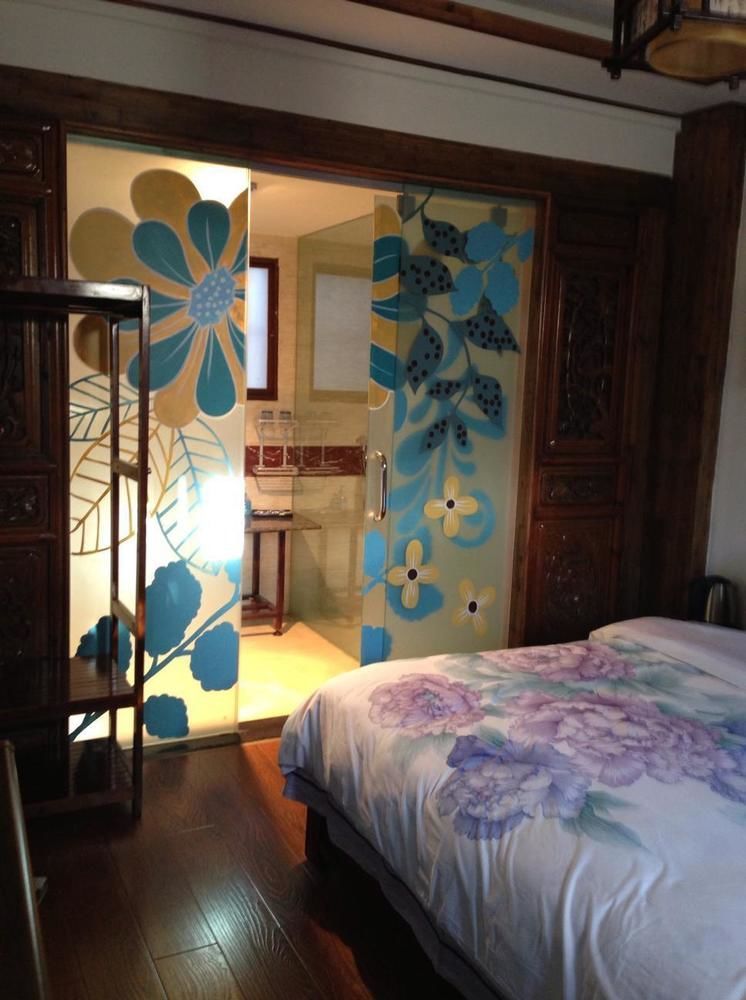 ליג'יאנג Tree'S Tale Hotel - Lijiang מראה חיצוני תמונה