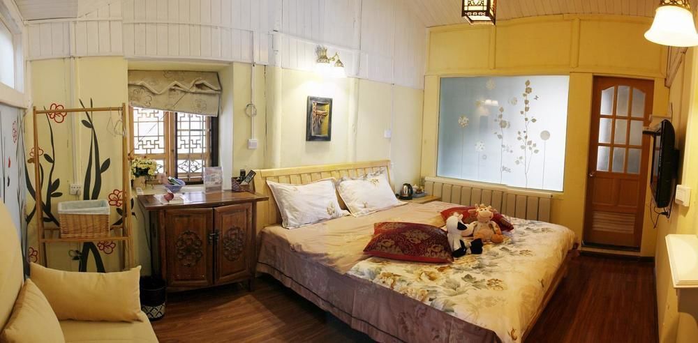 ליג'יאנג Tree'S Tale Hotel - Lijiang מראה חיצוני תמונה