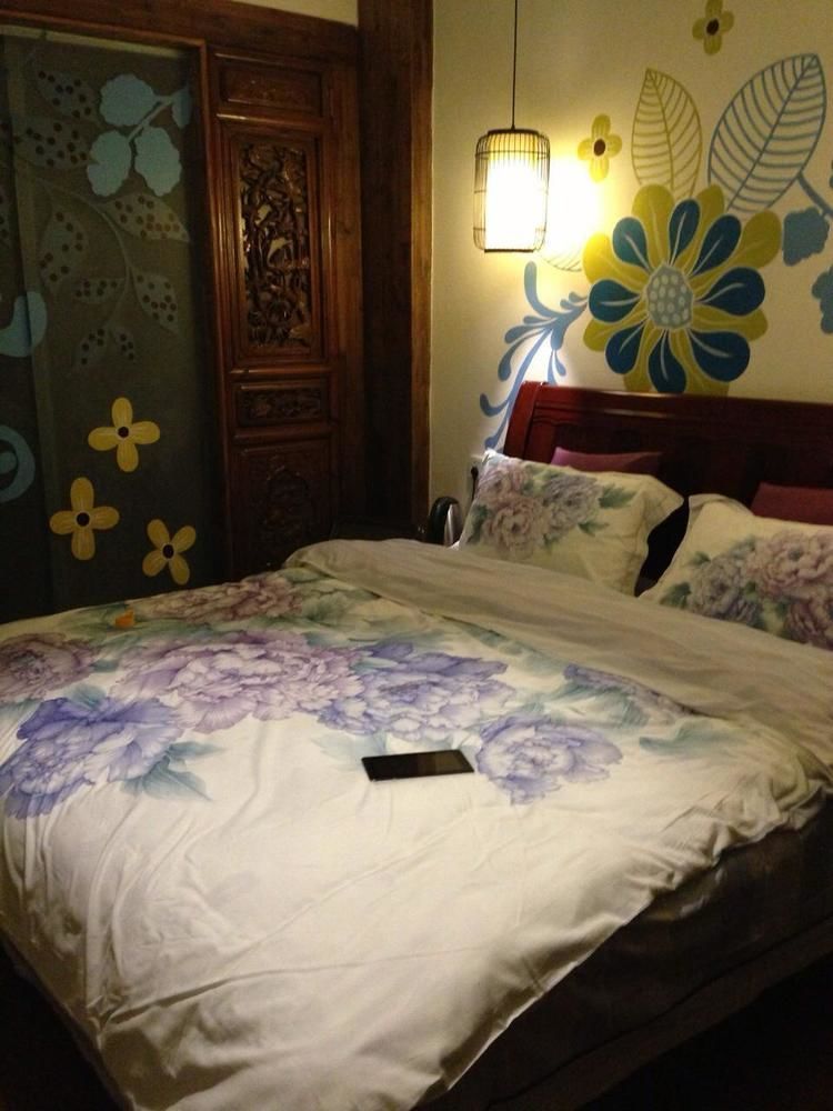 ליג'יאנג Tree'S Tale Hotel - Lijiang מראה חיצוני תמונה