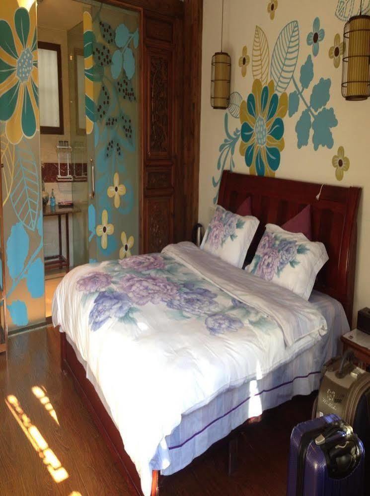 ליג'יאנג Tree'S Tale Hotel - Lijiang מראה חיצוני תמונה