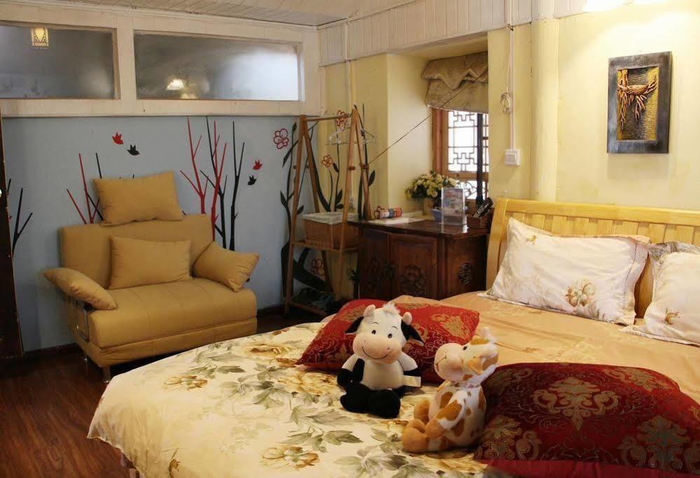 ליג'יאנג Tree'S Tale Hotel - Lijiang מראה חיצוני תמונה