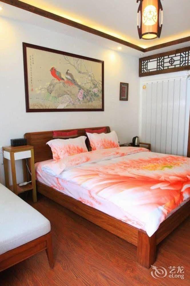 ליג'יאנג Tree'S Tale Hotel - Lijiang מראה חיצוני תמונה
