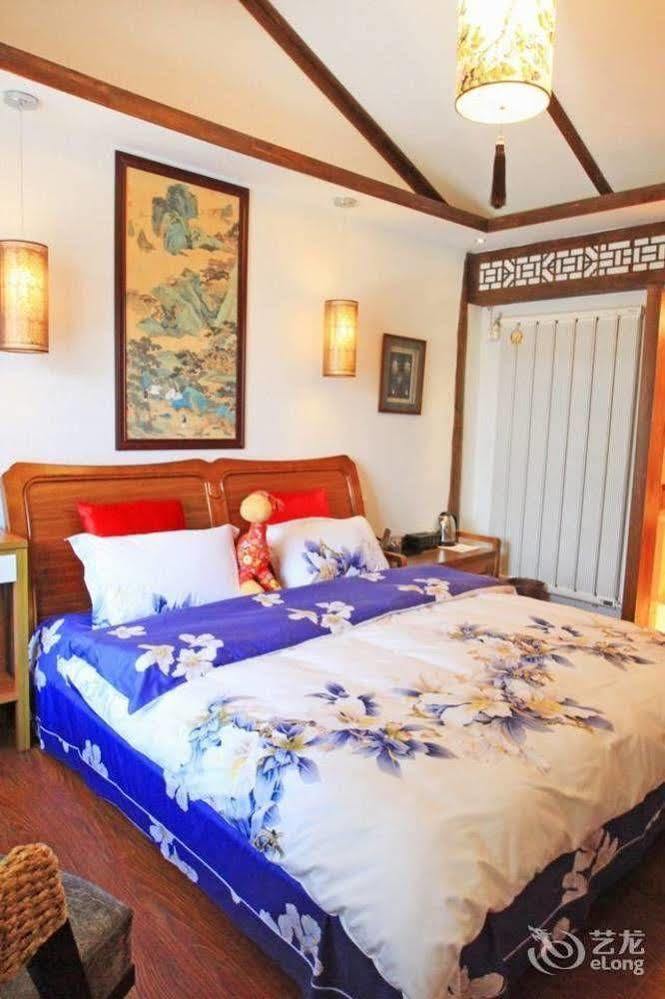 ליג'יאנג Tree'S Tale Hotel - Lijiang מראה חיצוני תמונה