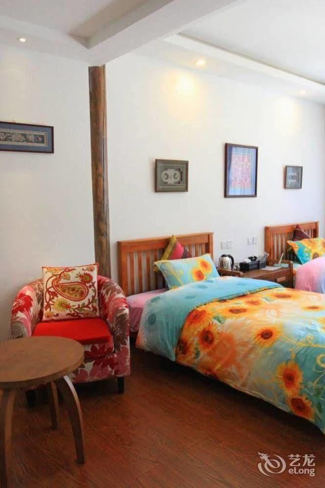 ליג'יאנג Tree'S Tale Hotel - Lijiang מראה חיצוני תמונה